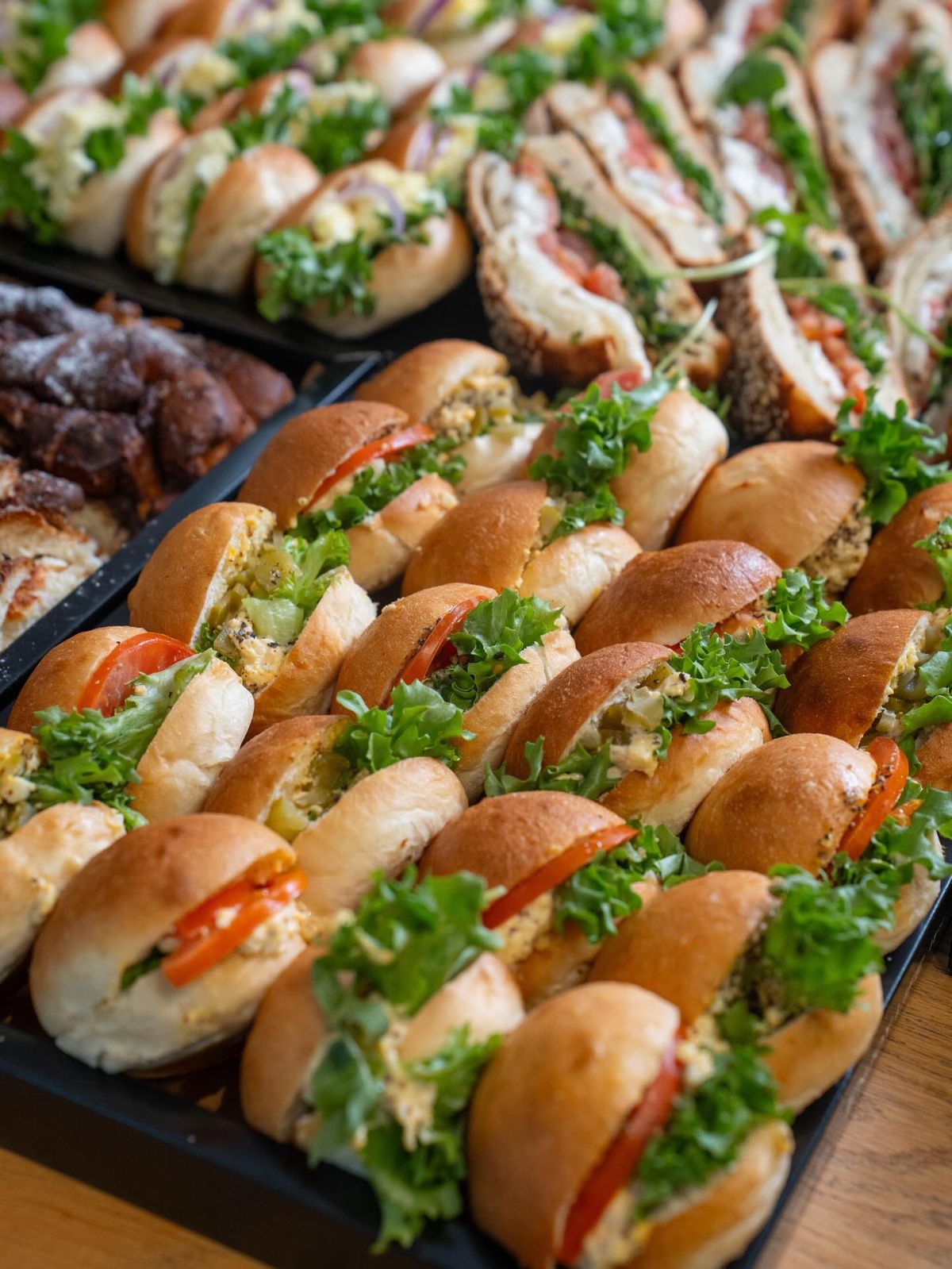 Modern bright cafe interior with fresh pastries and coffee