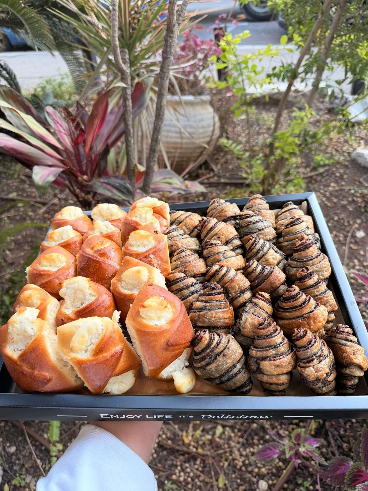 Modern bright cafe interior with fresh pastries and coffee