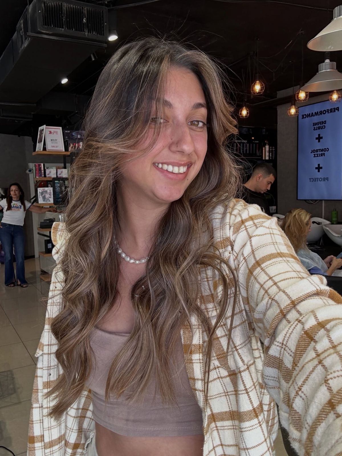 Interior of a luxury modern hair salon with warm lighting