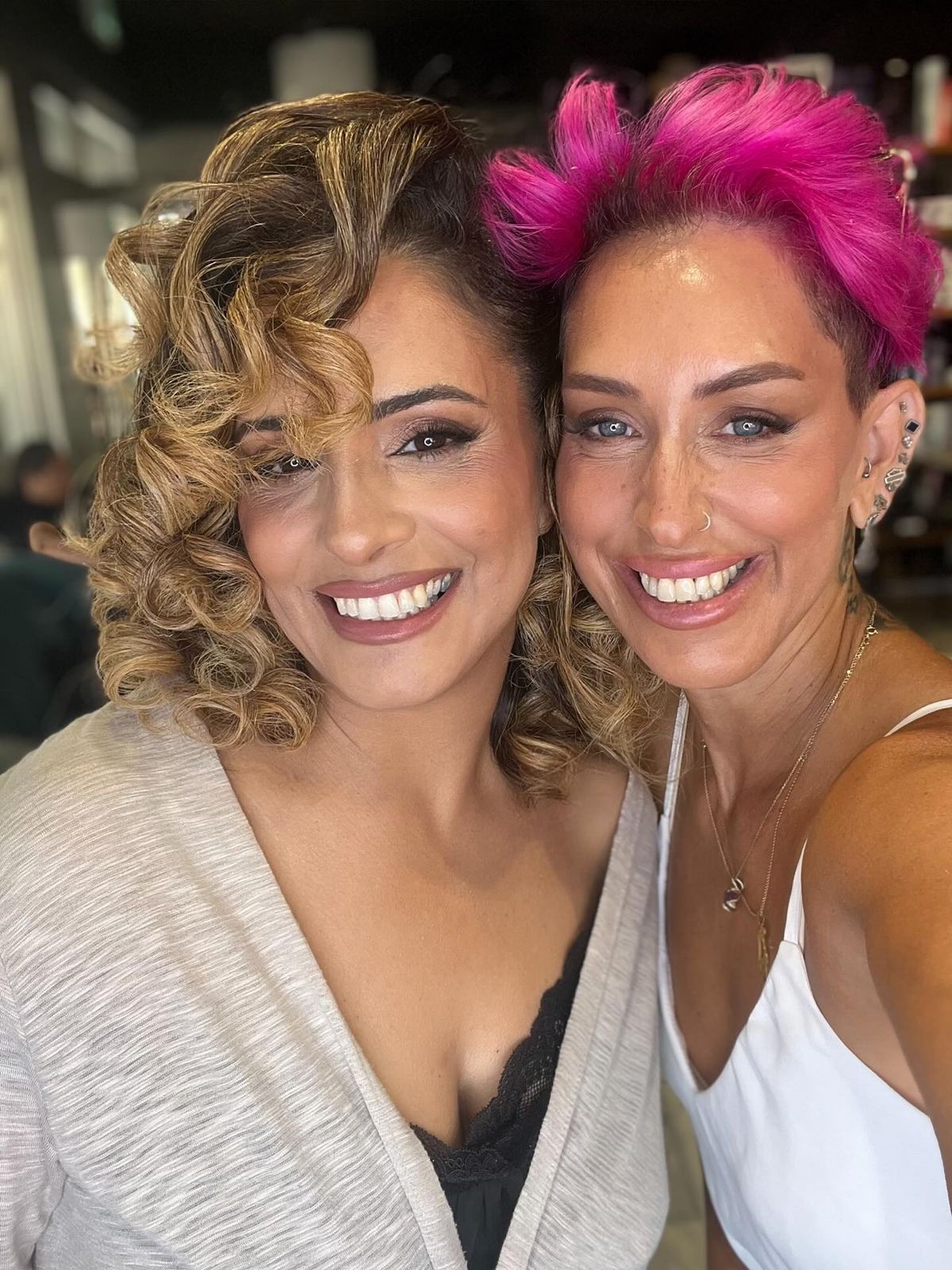 Interior of a luxury modern hair salon with warm lighting